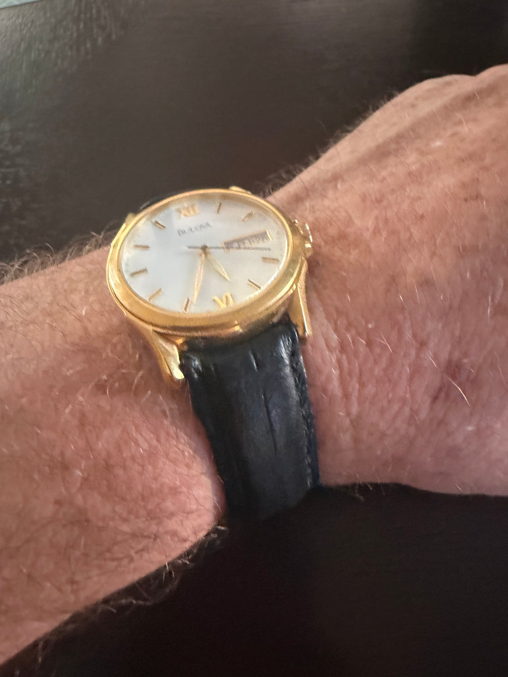 Bulova Men’s Gold Tone Quartz Dress Watch Day Date White Dial Black Leather Strap
