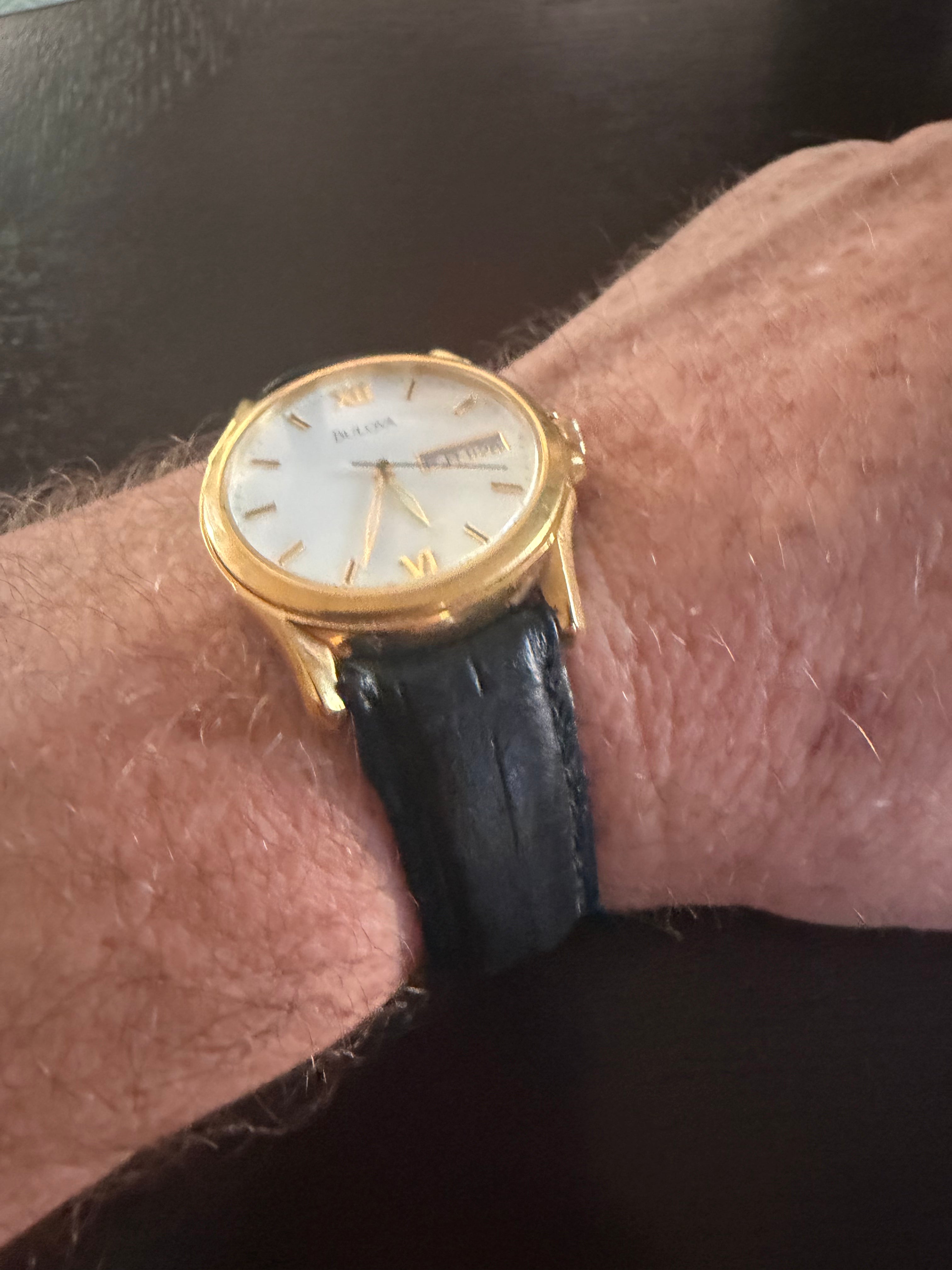 Bulova Men’s Gold Tone Quartz Dress Watch Day Date White Dial Black Leather Strap