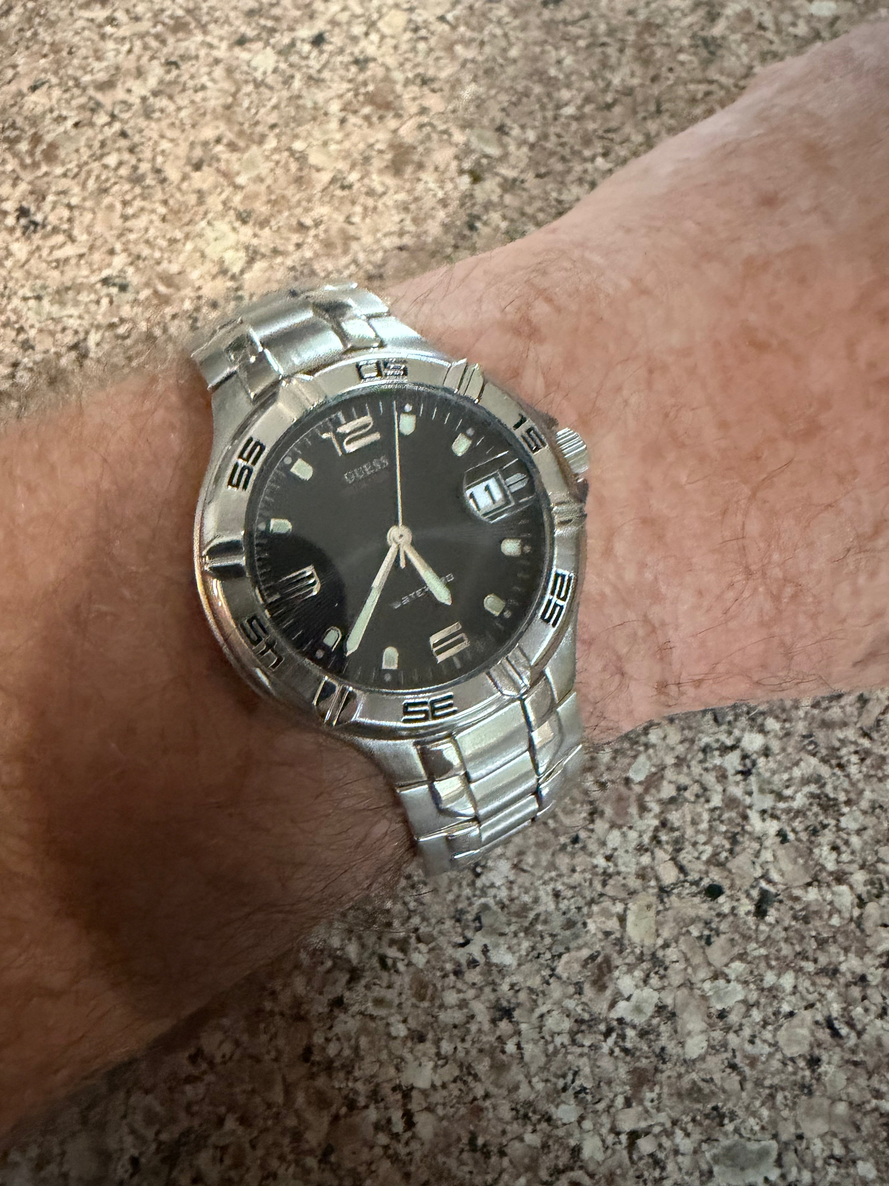 Guess W95143G Men’s Stainless Steel Quartz Watch Black Dial Date 100M Water Resistant