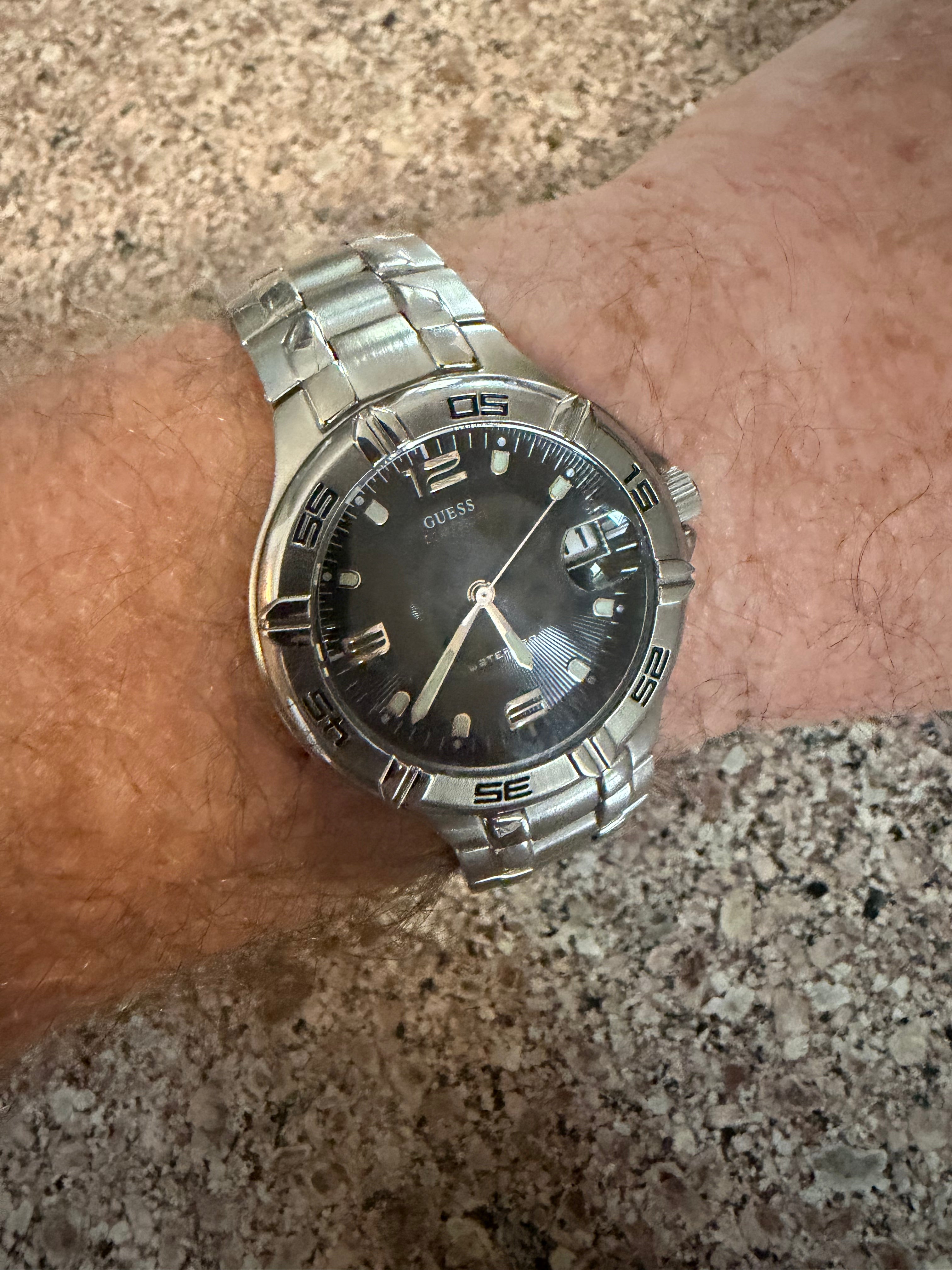 Guess W95143G Men’s Stainless Steel Quartz Watch Black Dial Date 100M Water Resistant