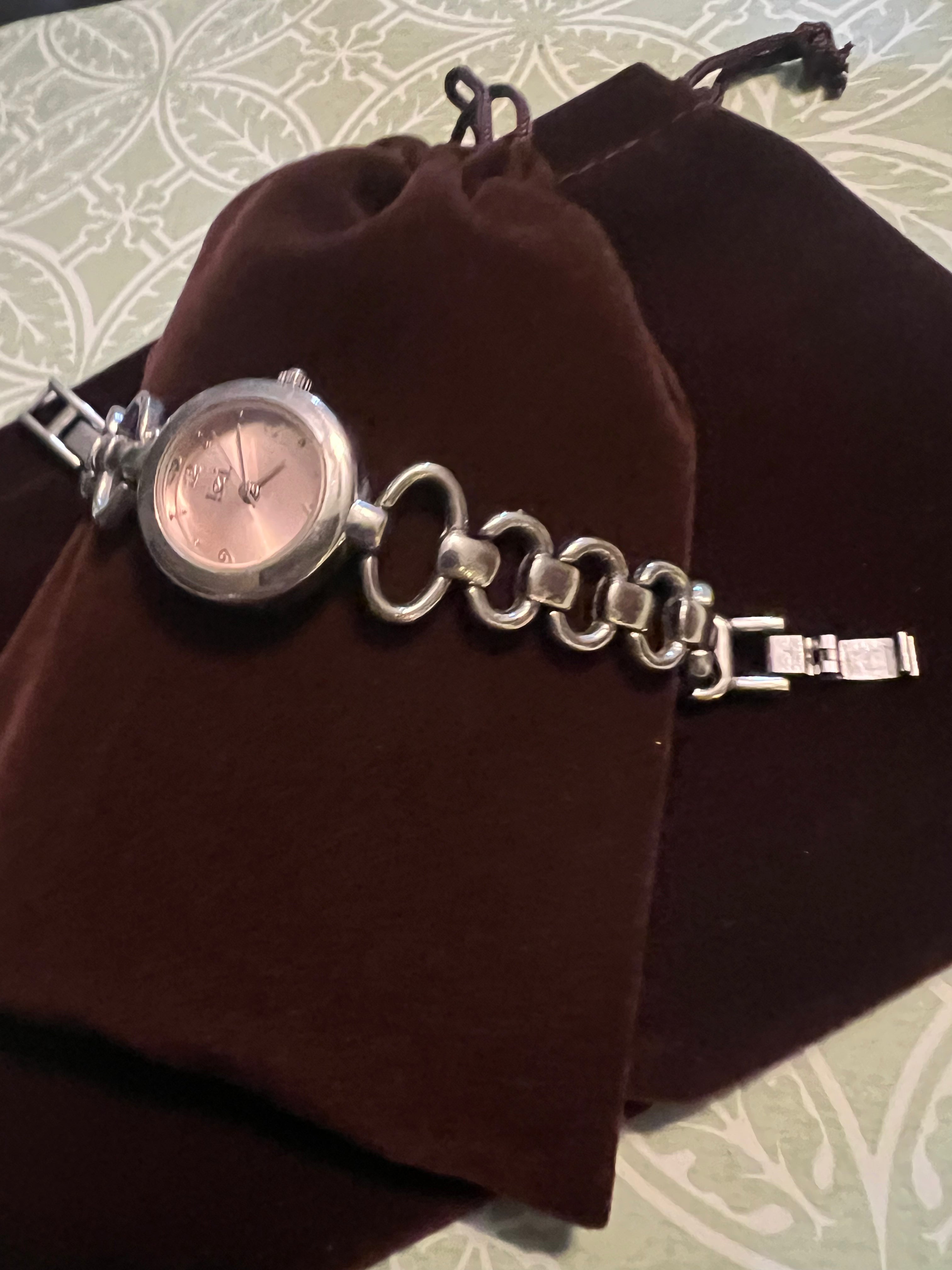 90’s LEI dainty ladies watch. Silver tone, pink dial, new battery, gasket, and gift pouch