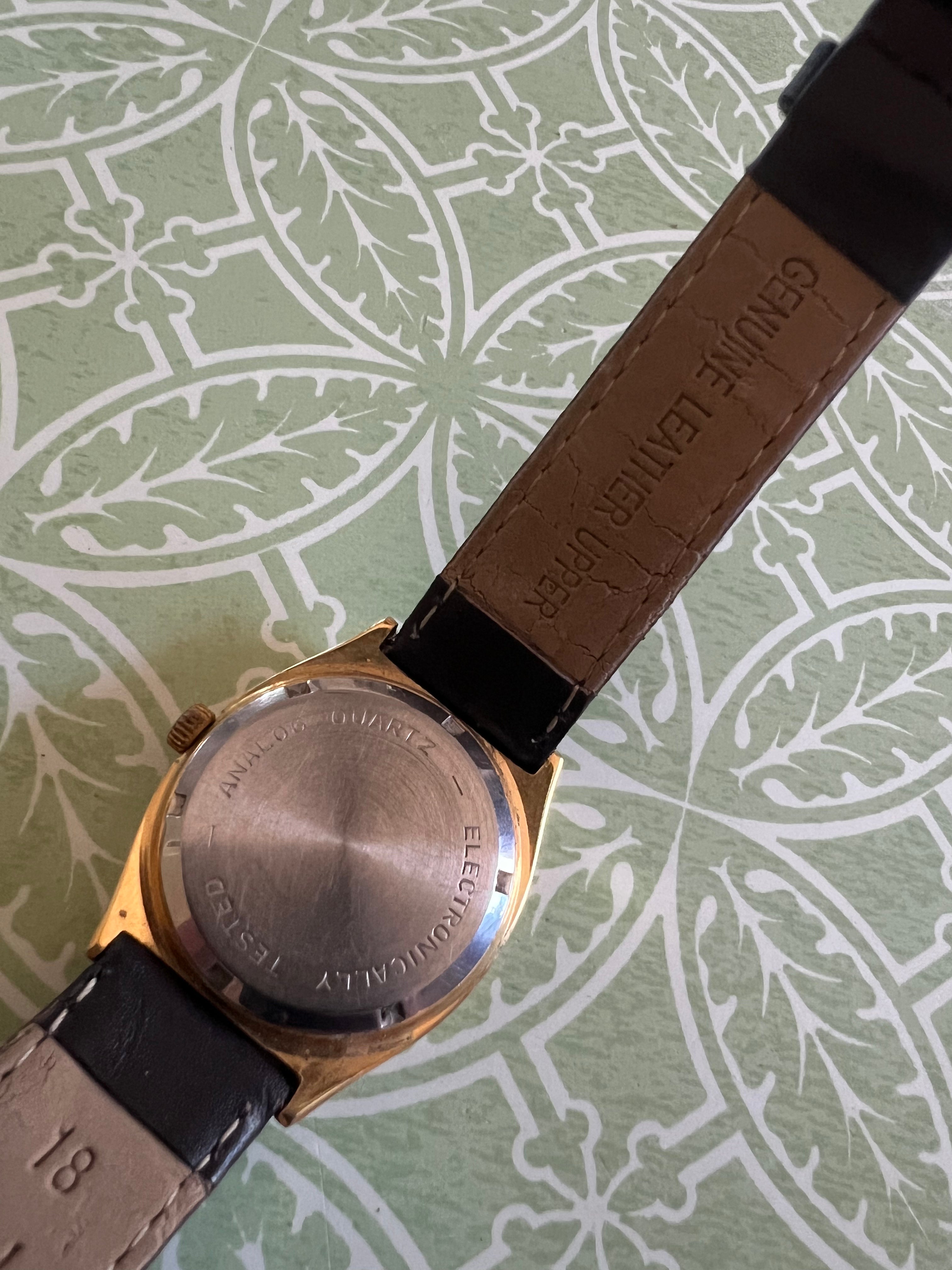 Vintage men’s Armitron tank watch.