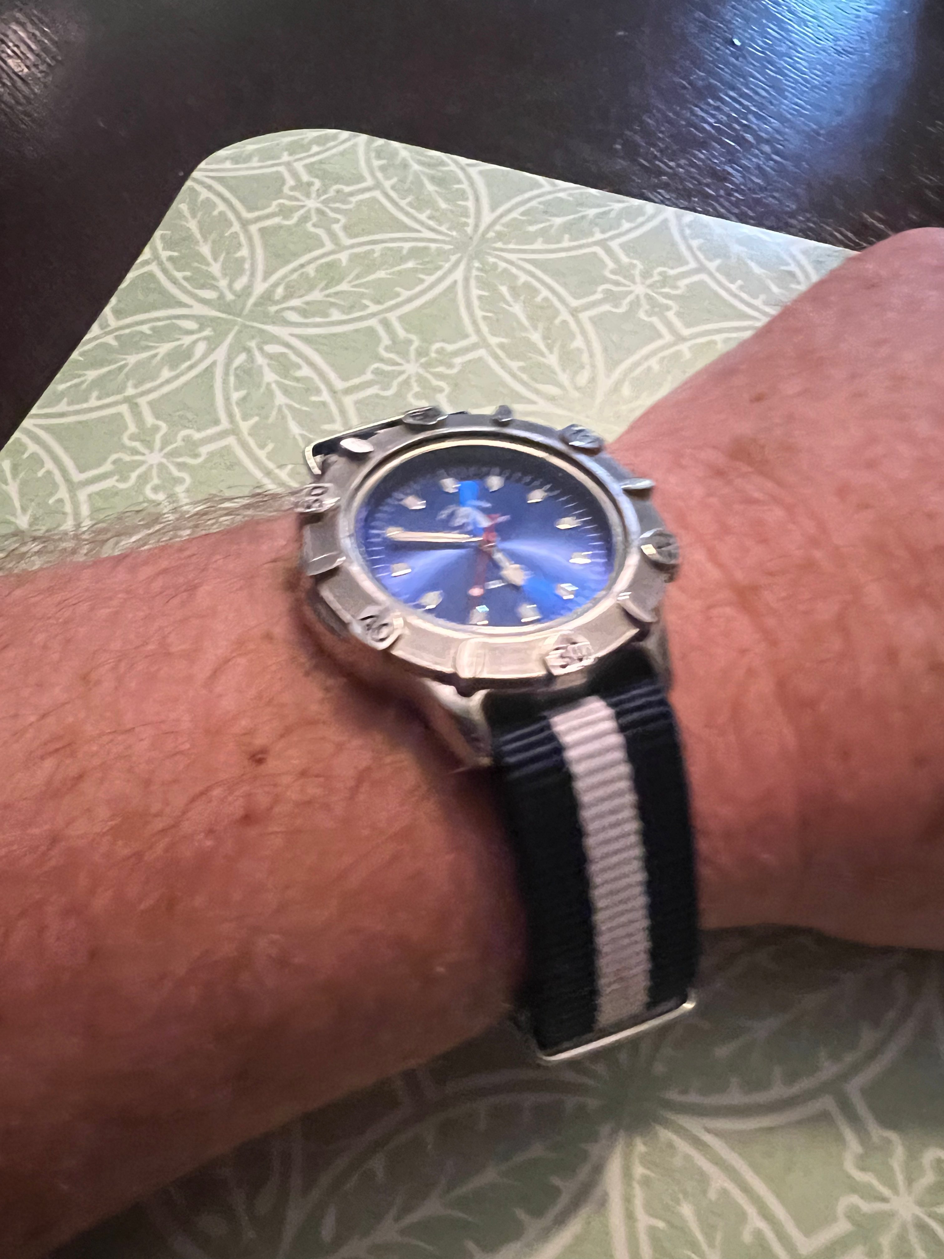 2001 men’s Polo watch. Rotating bezel, nato strap, new battery