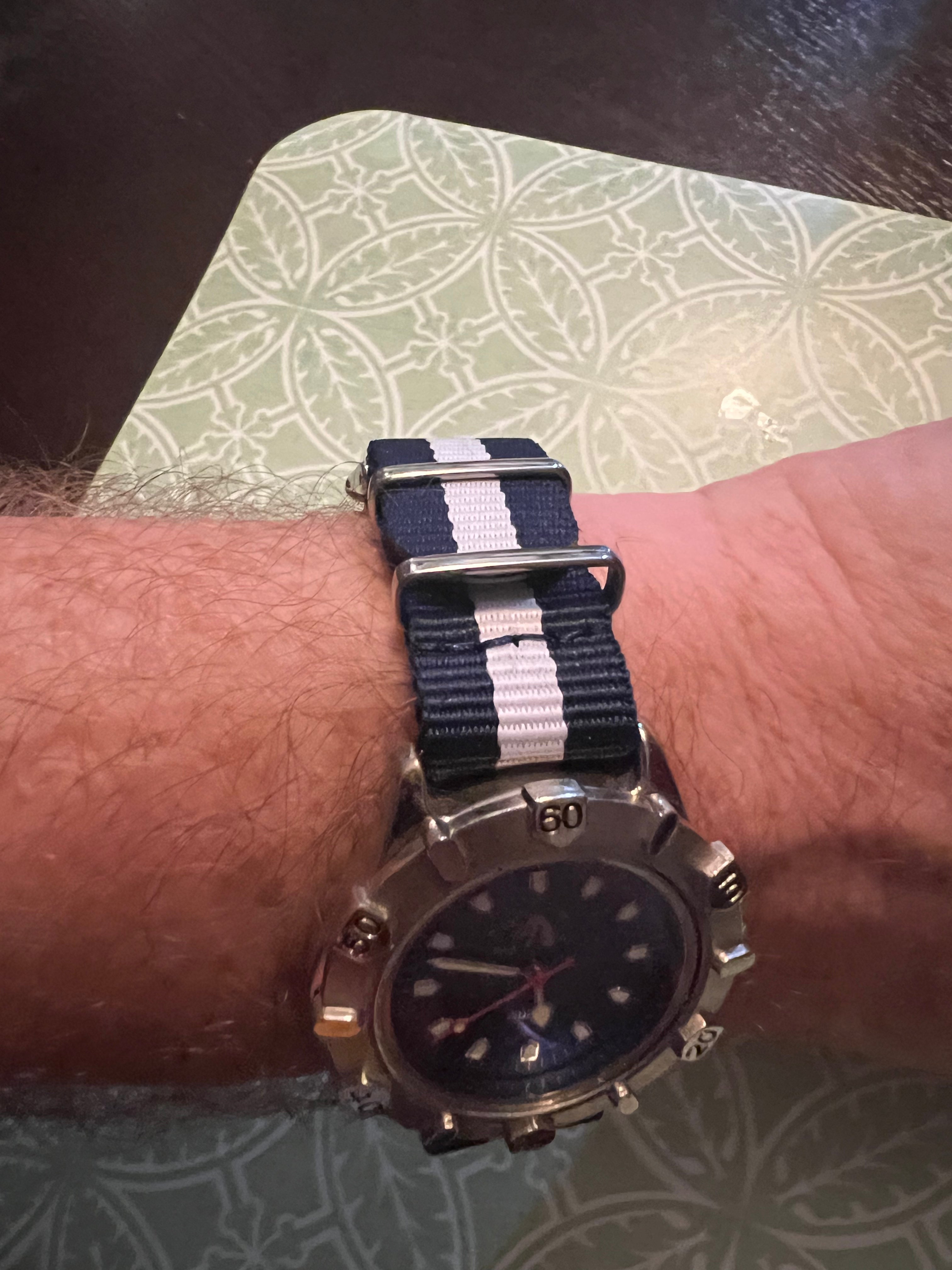 2001 men’s Polo watch. Rotating bezel, nato strap, new battery