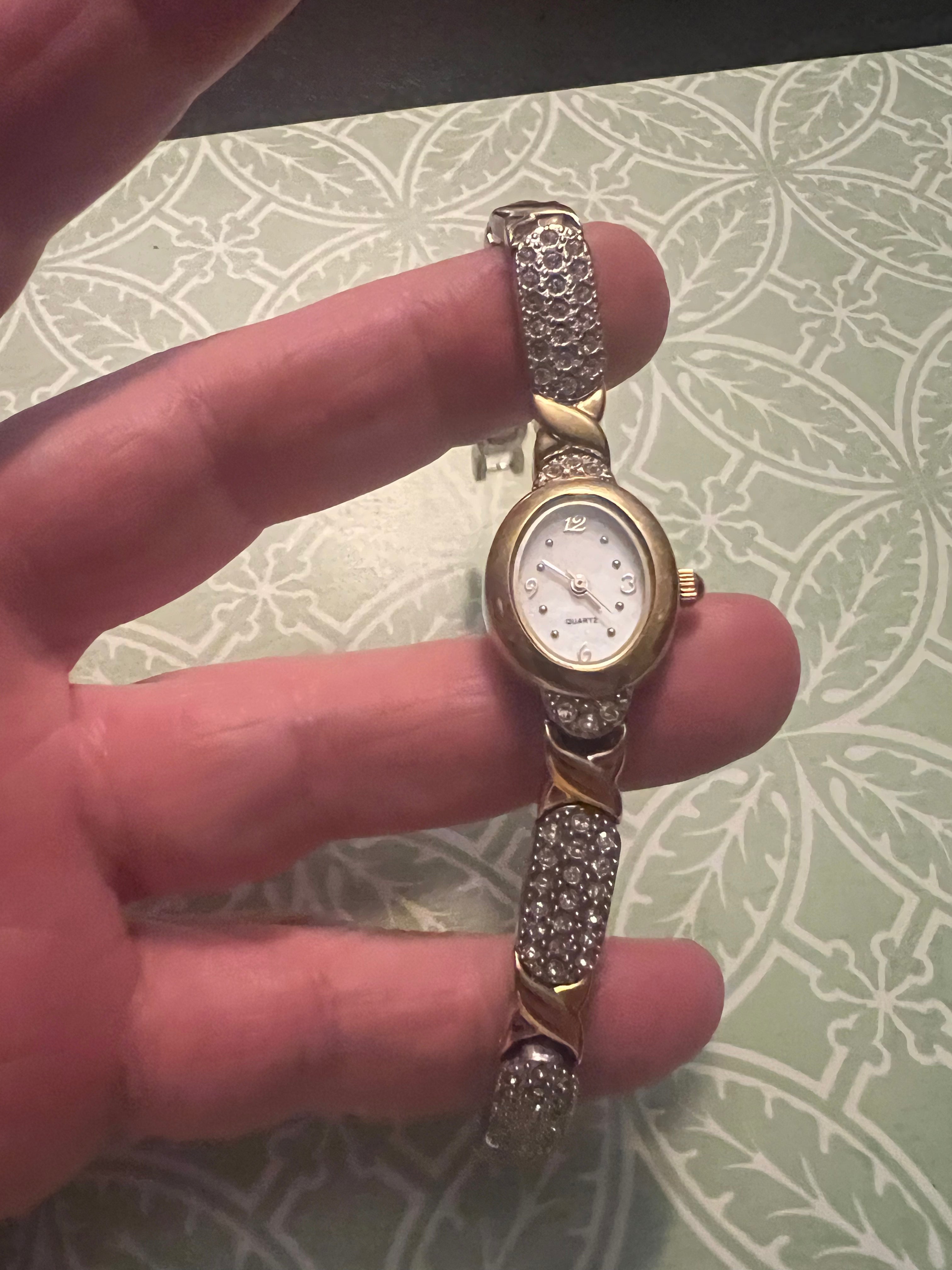 Dainty vintage ladies gold watch with crystal accent $10