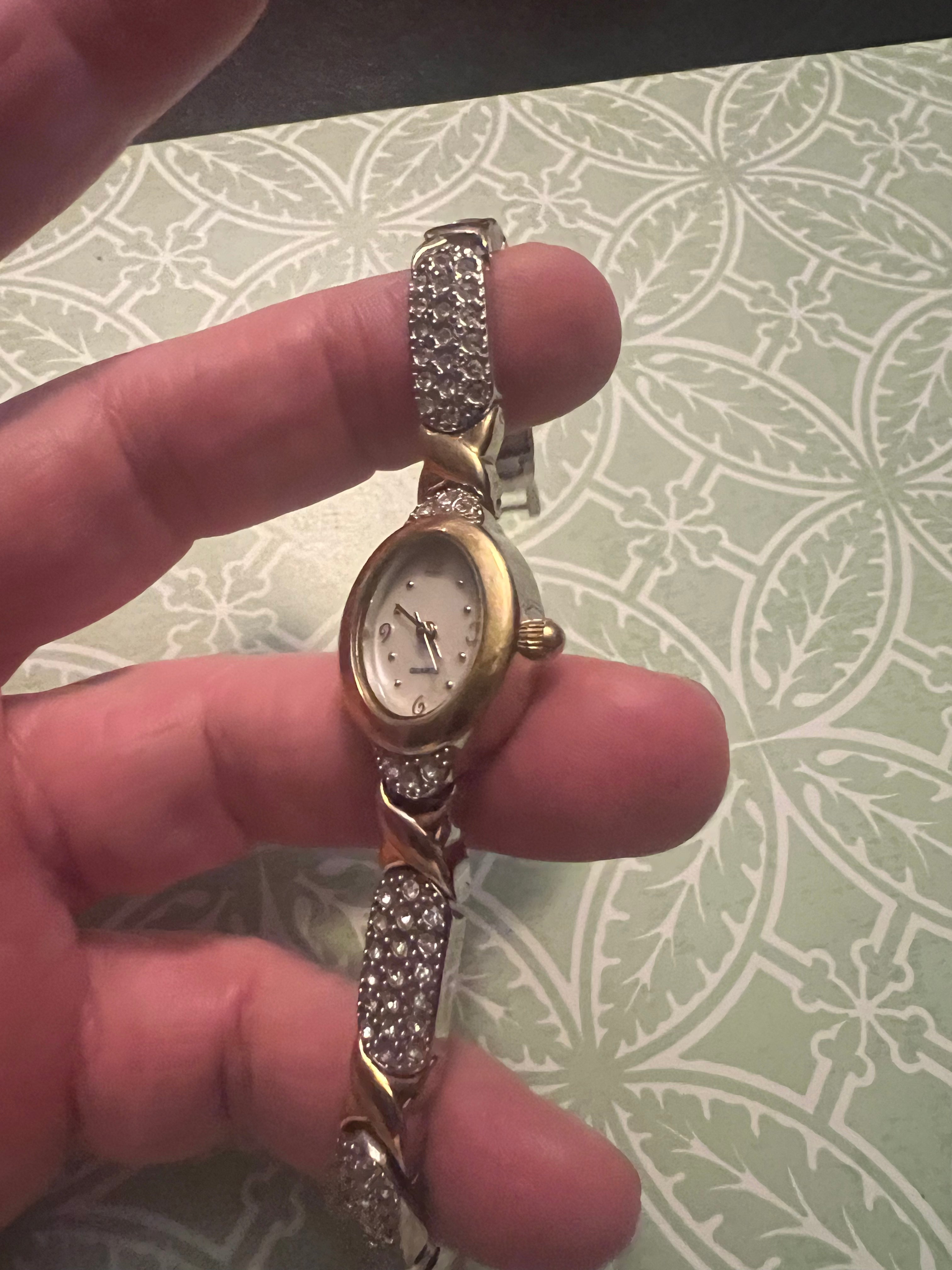 Dainty vintage ladies gold watch with crystal accent $10