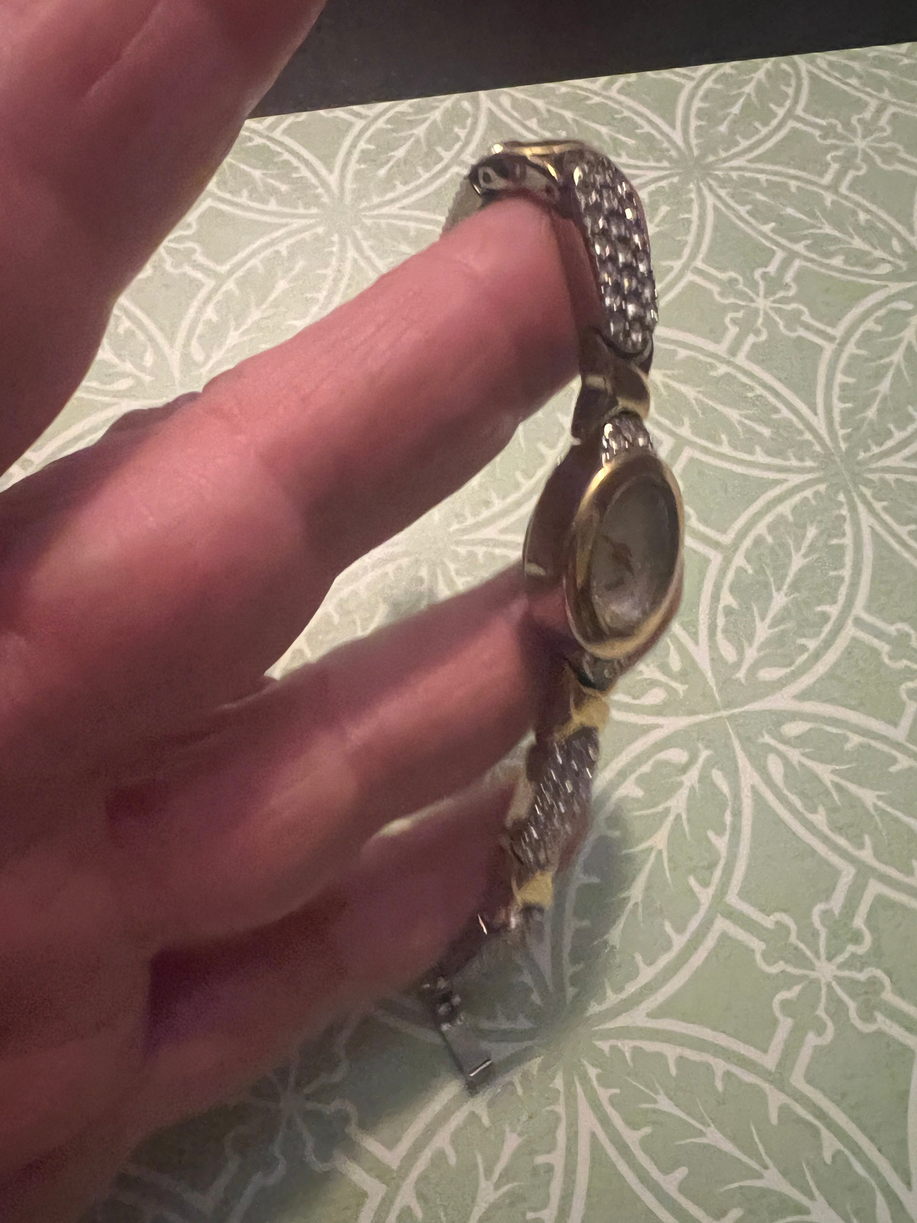 Dainty vintage ladies gold watch with crystal accent $10