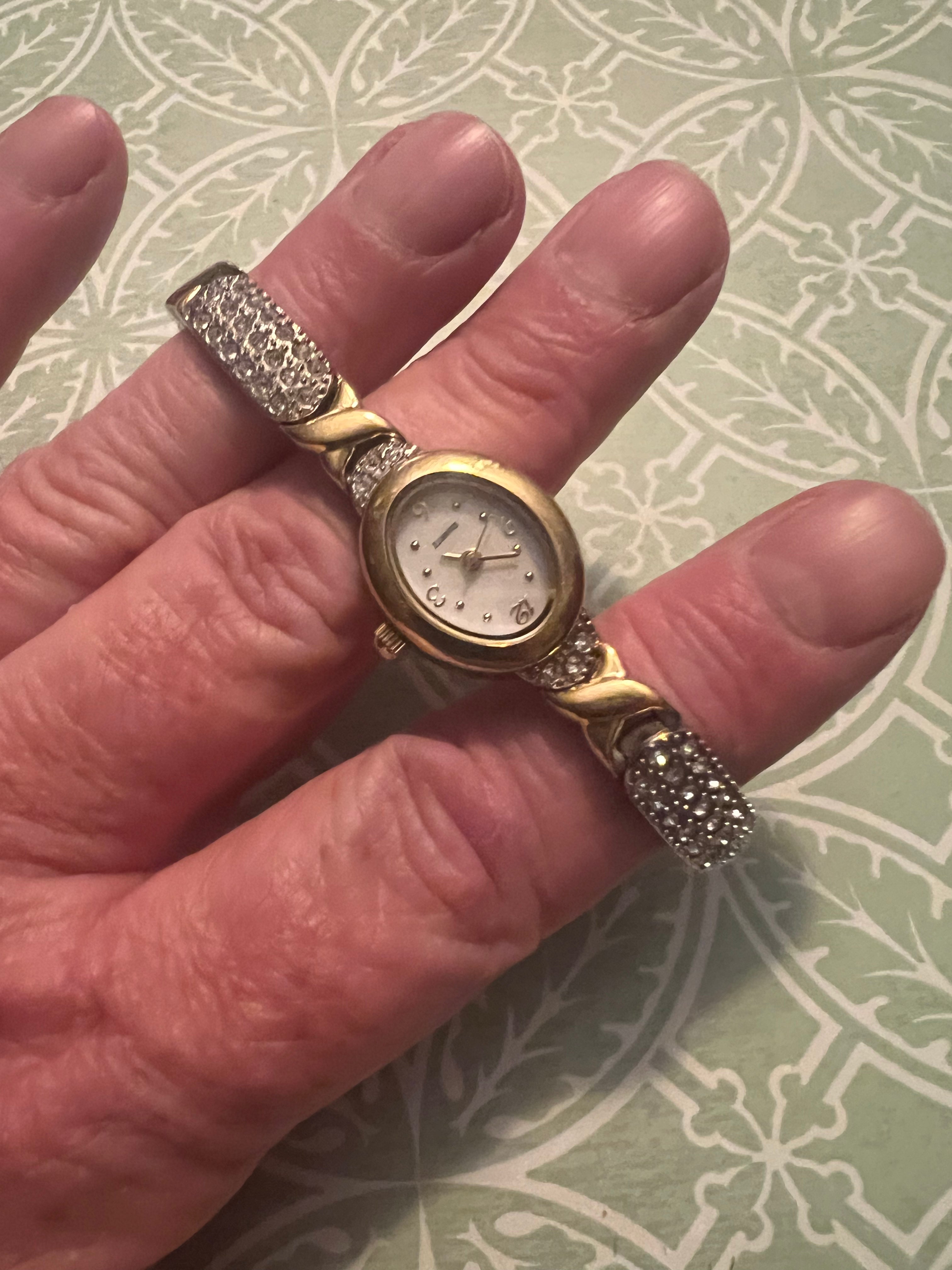 Dainty vintage ladies gold watch with crystal accent $10