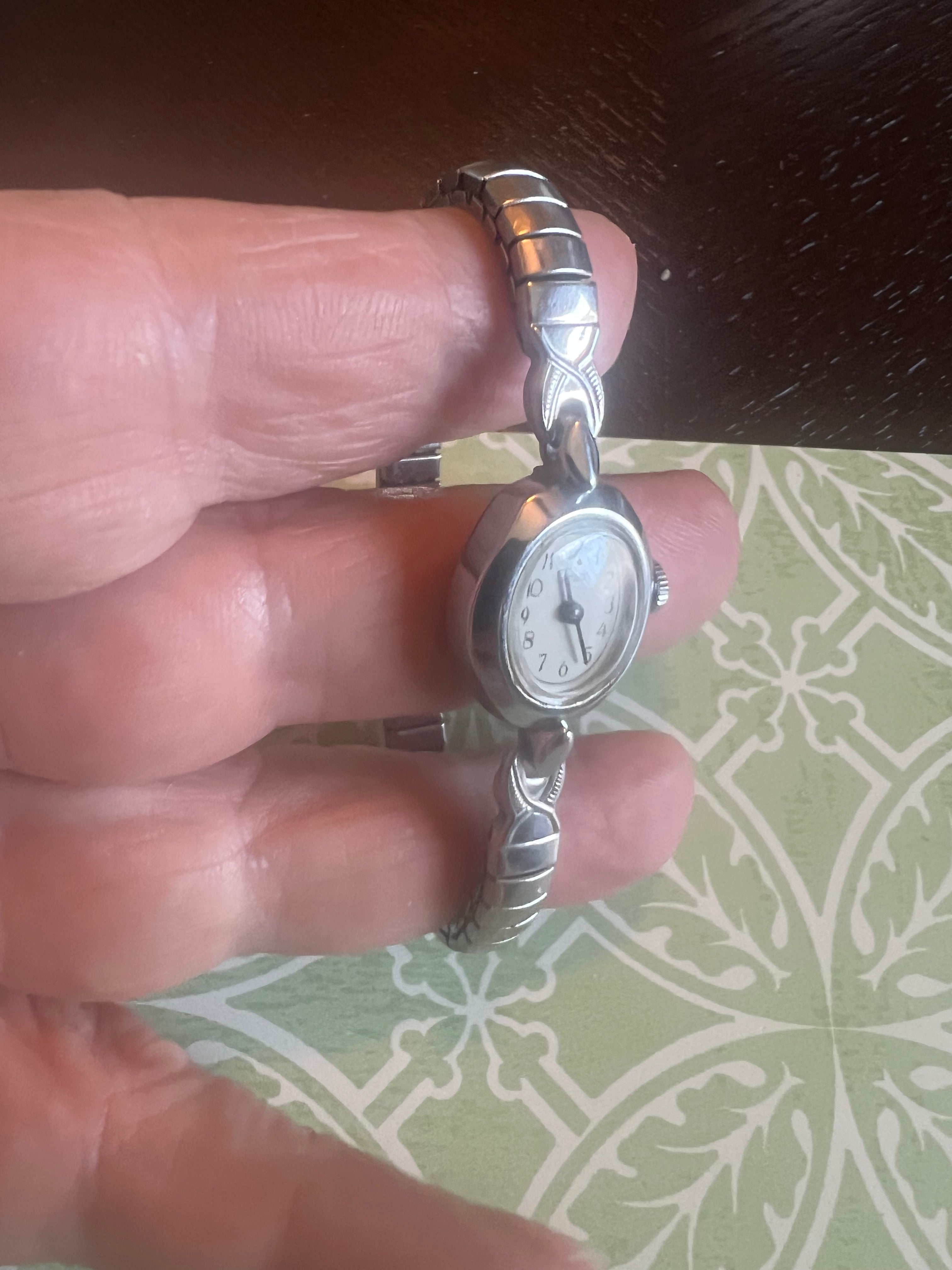 Dainty Timex vintage ladies winding watch. Runs great.