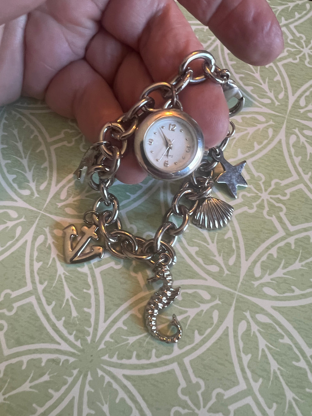 Ladies ocean themed charm bracelet watch. New battery.