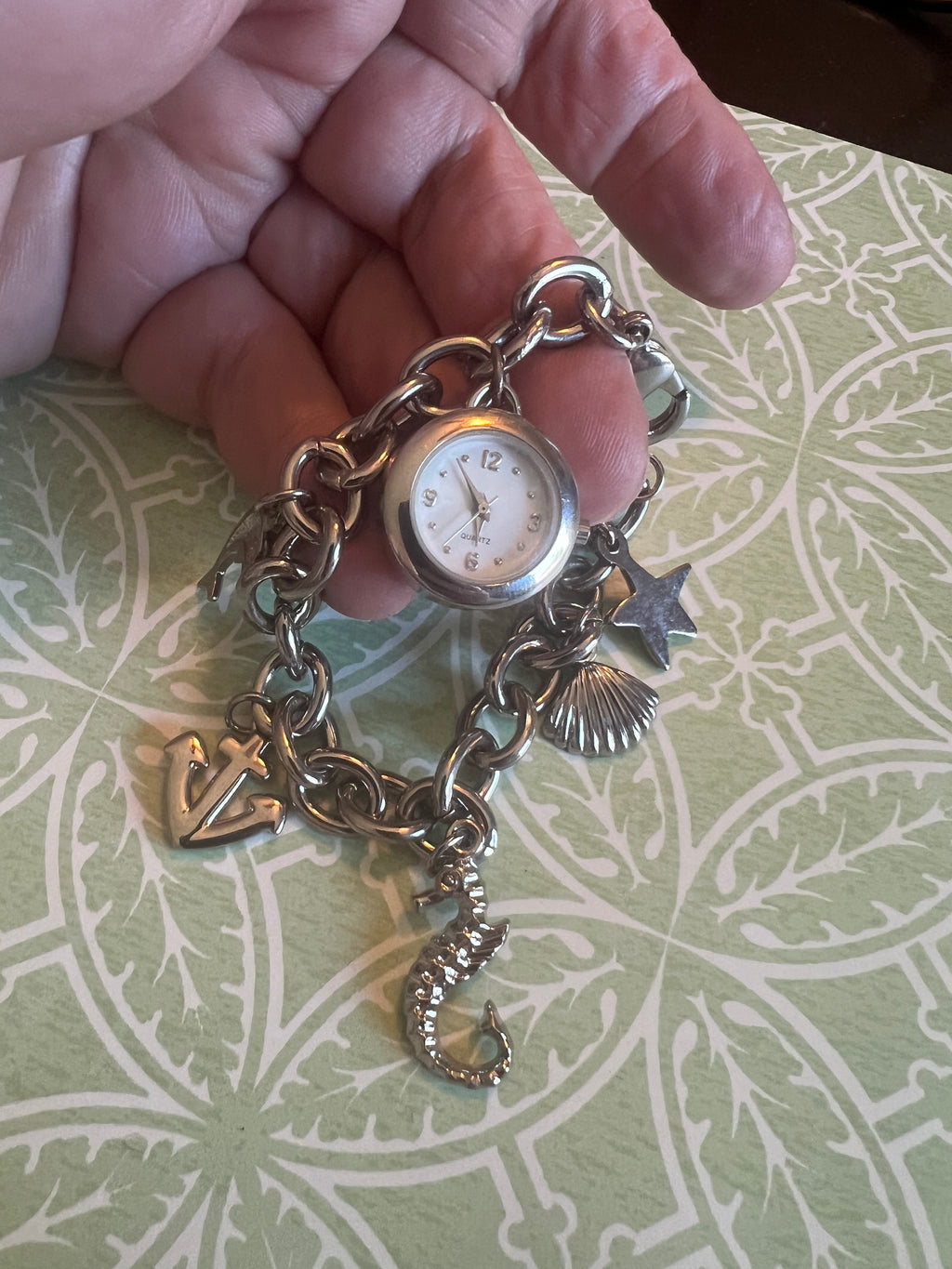 Ladies ocean themed charm bracelet watch. New battery.