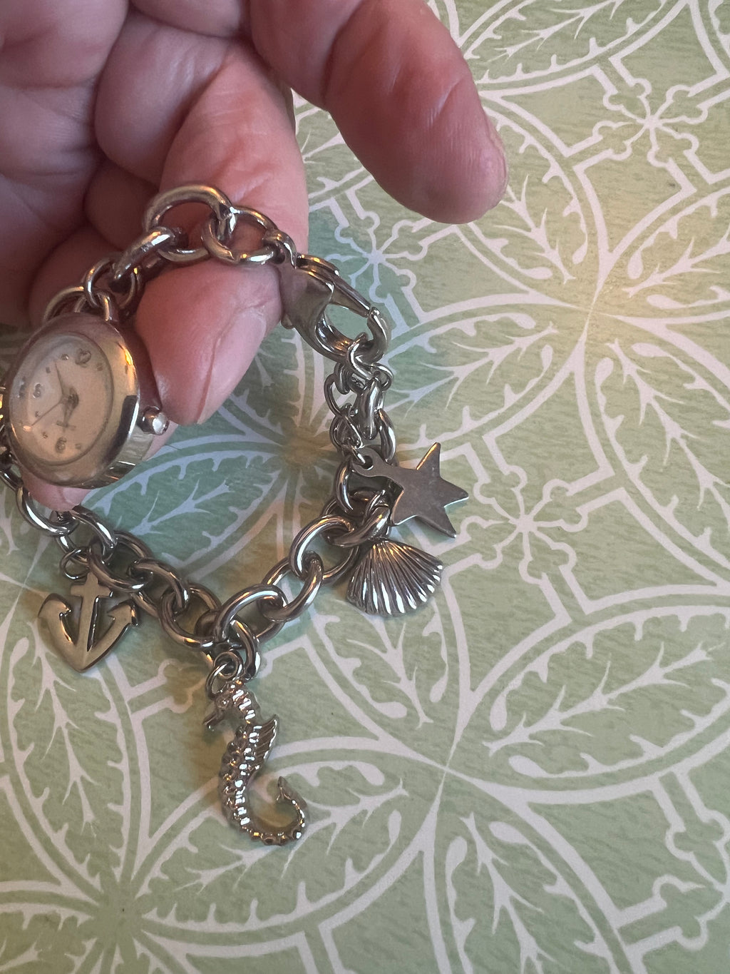 Ladies ocean themed charm bracelet watch. New battery.