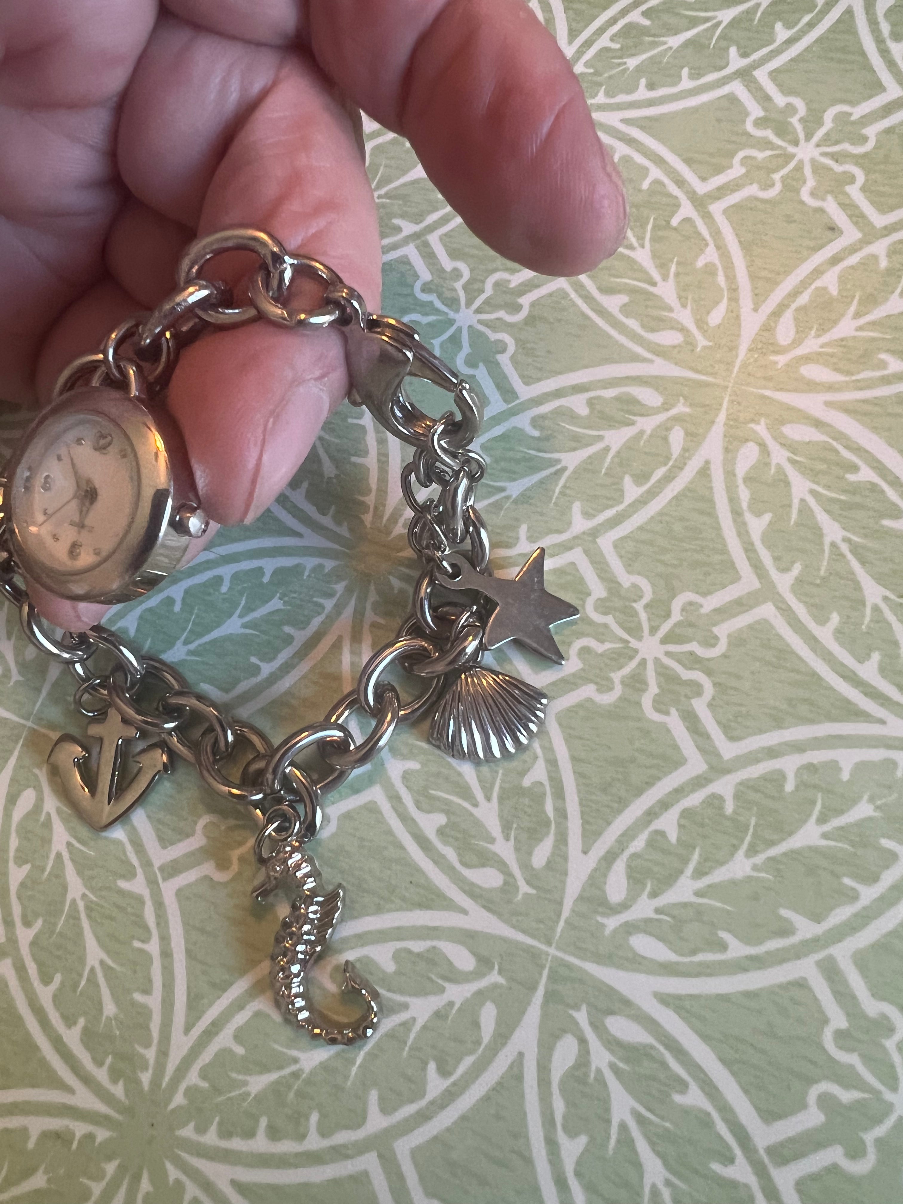 Ladies ocean themed charm bracelet watch. New battery.