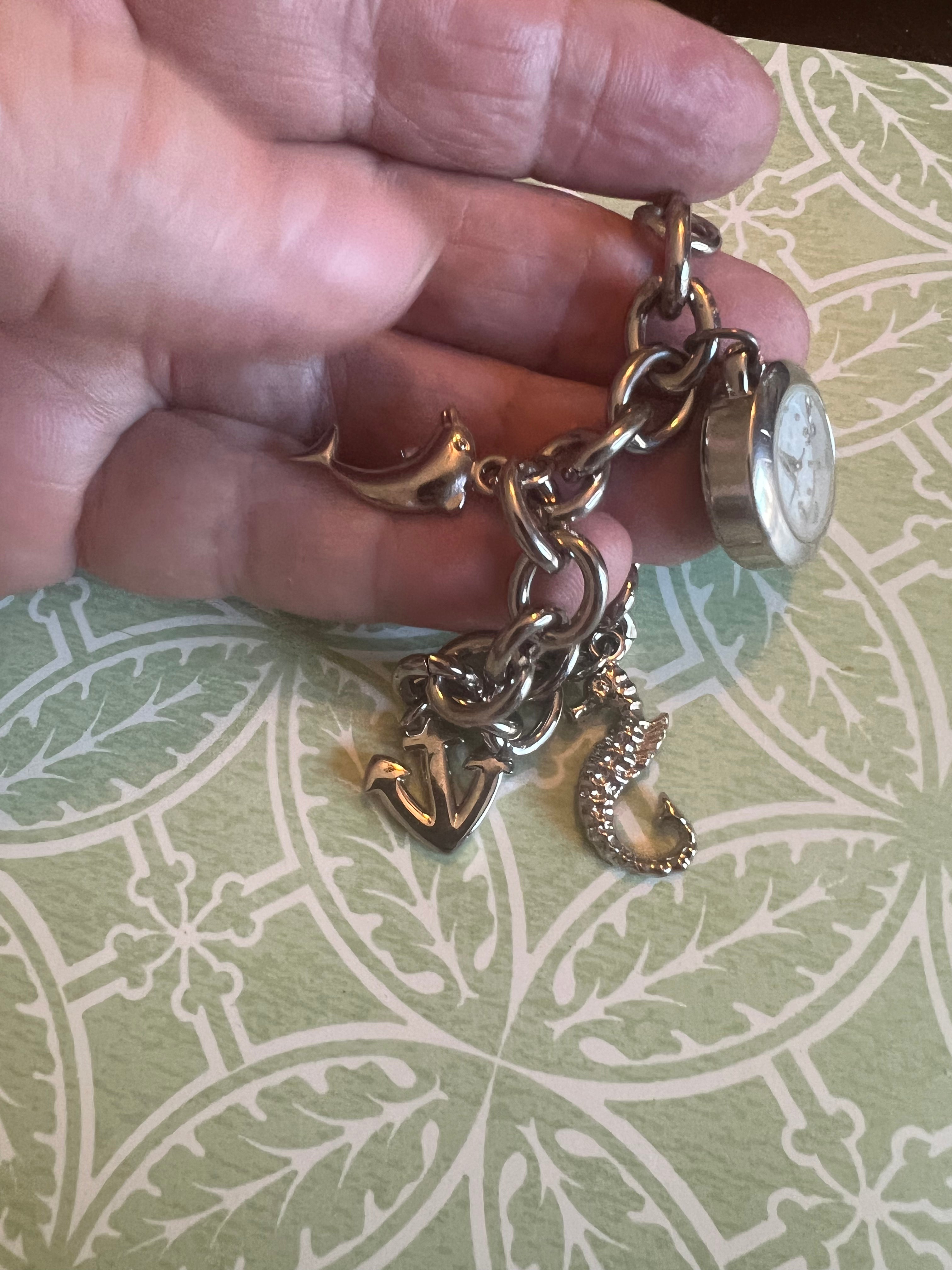 Ladies ocean themed charm bracelet watch. New battery.