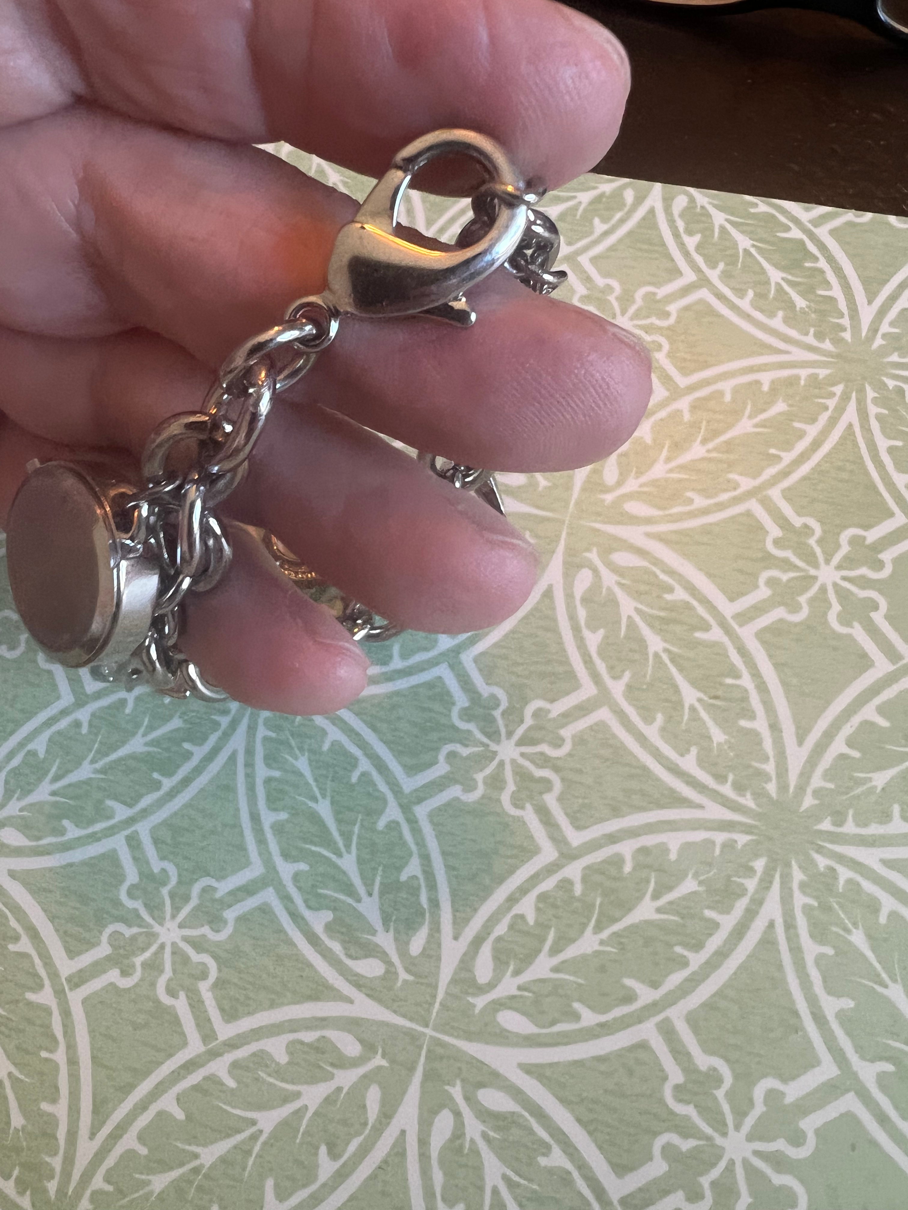 Ladies ocean themed charm bracelet watch. New battery.