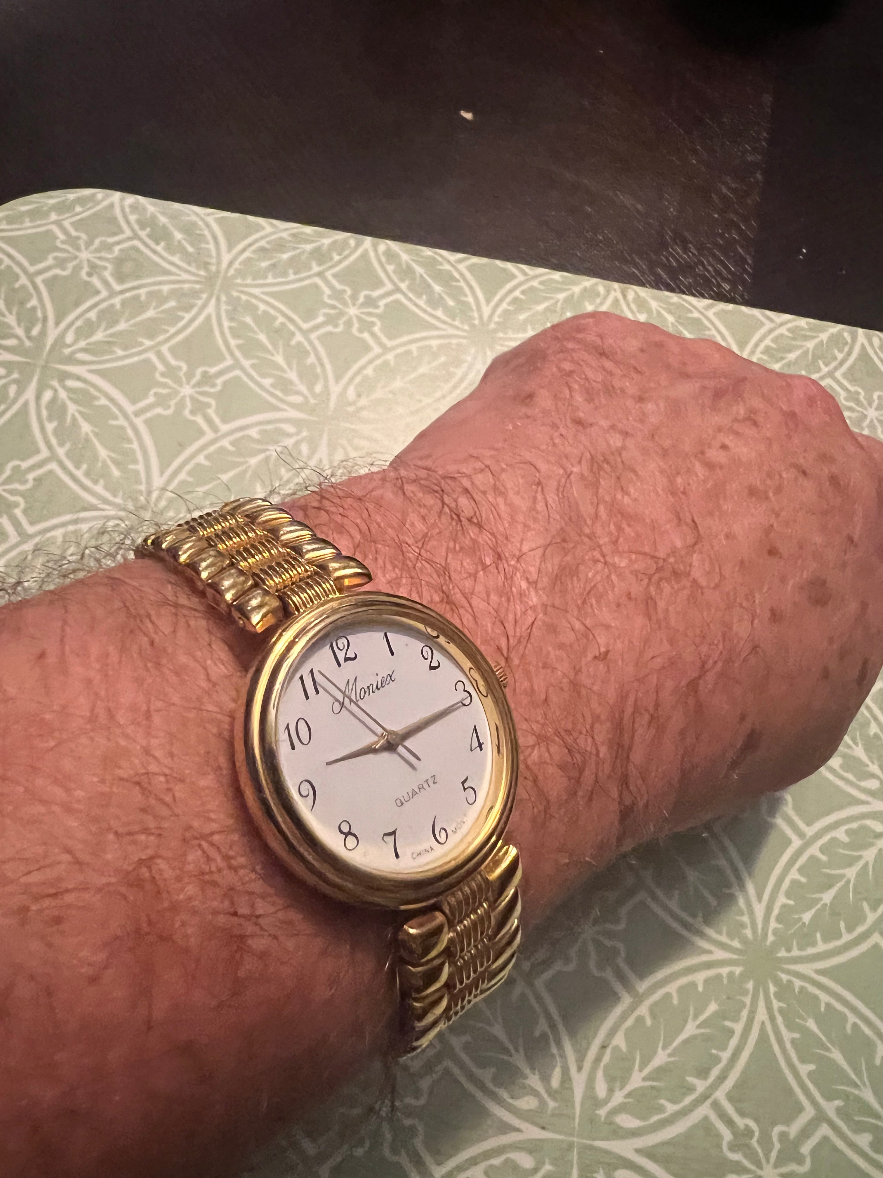 Men’s Moniex gold tone dress watch new battery