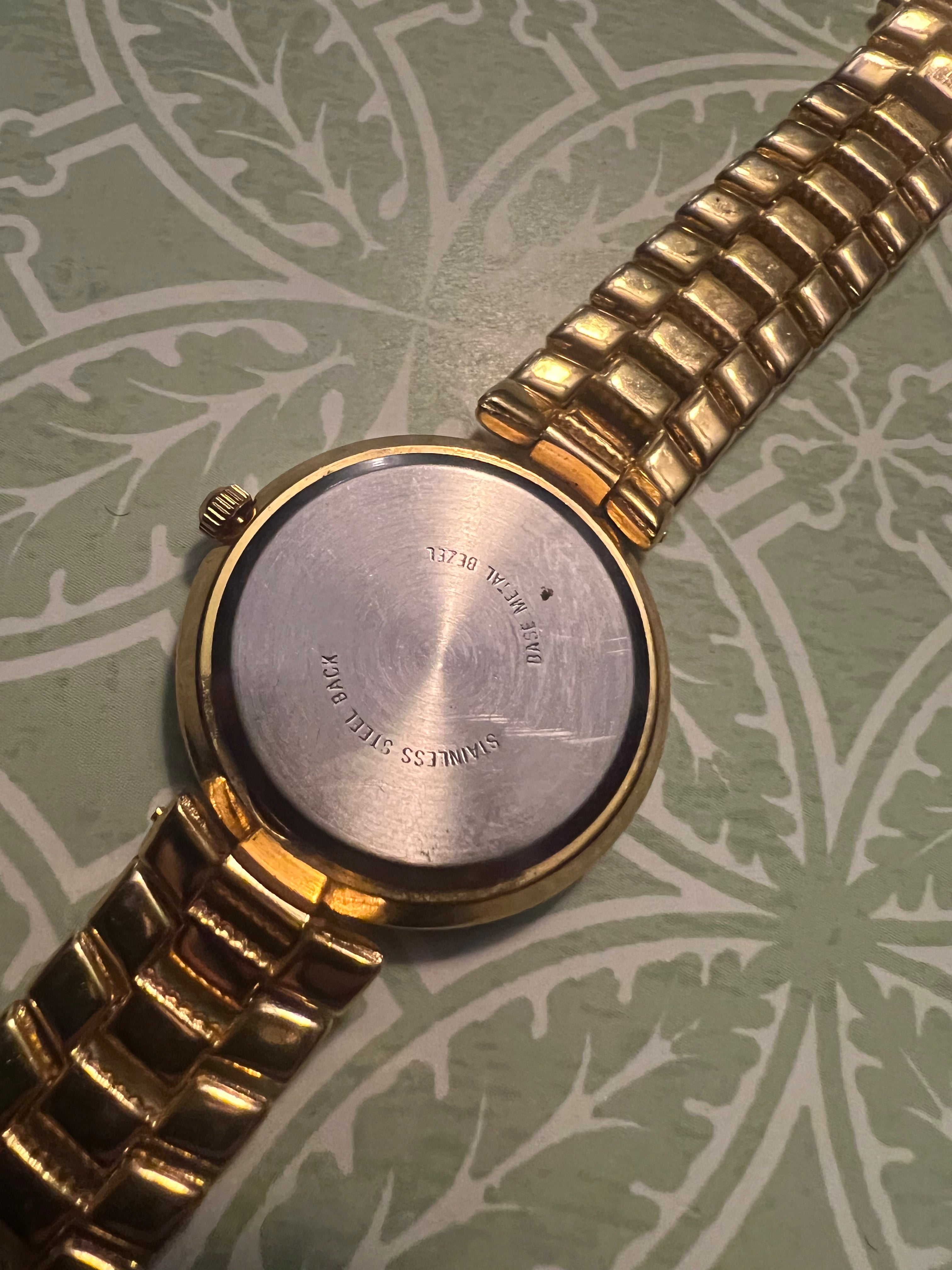 Men’s Moniex gold tone dress watch new battery