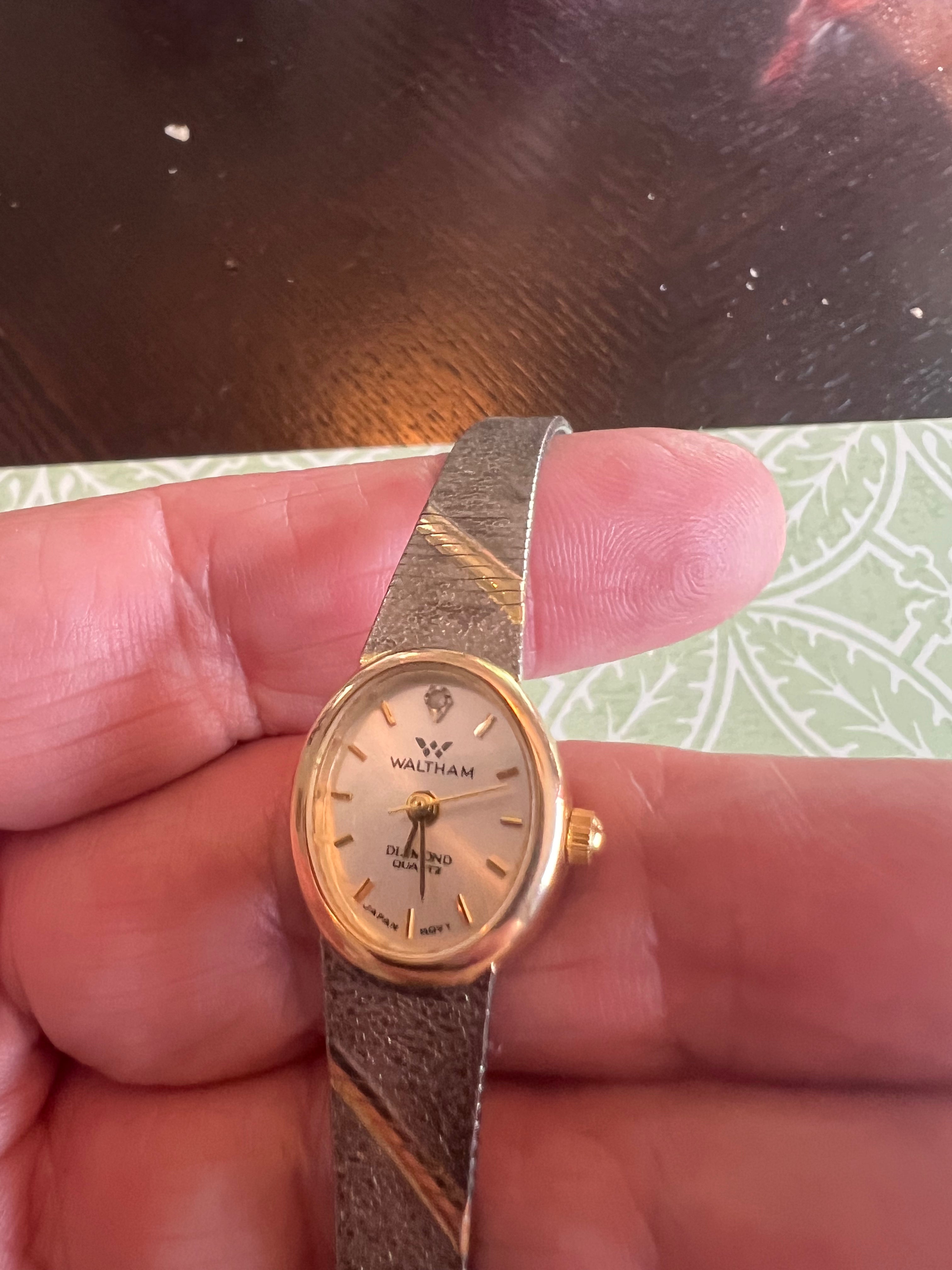 Vintage ladies Waltham dainty gold tone watch. Runs perfectly.