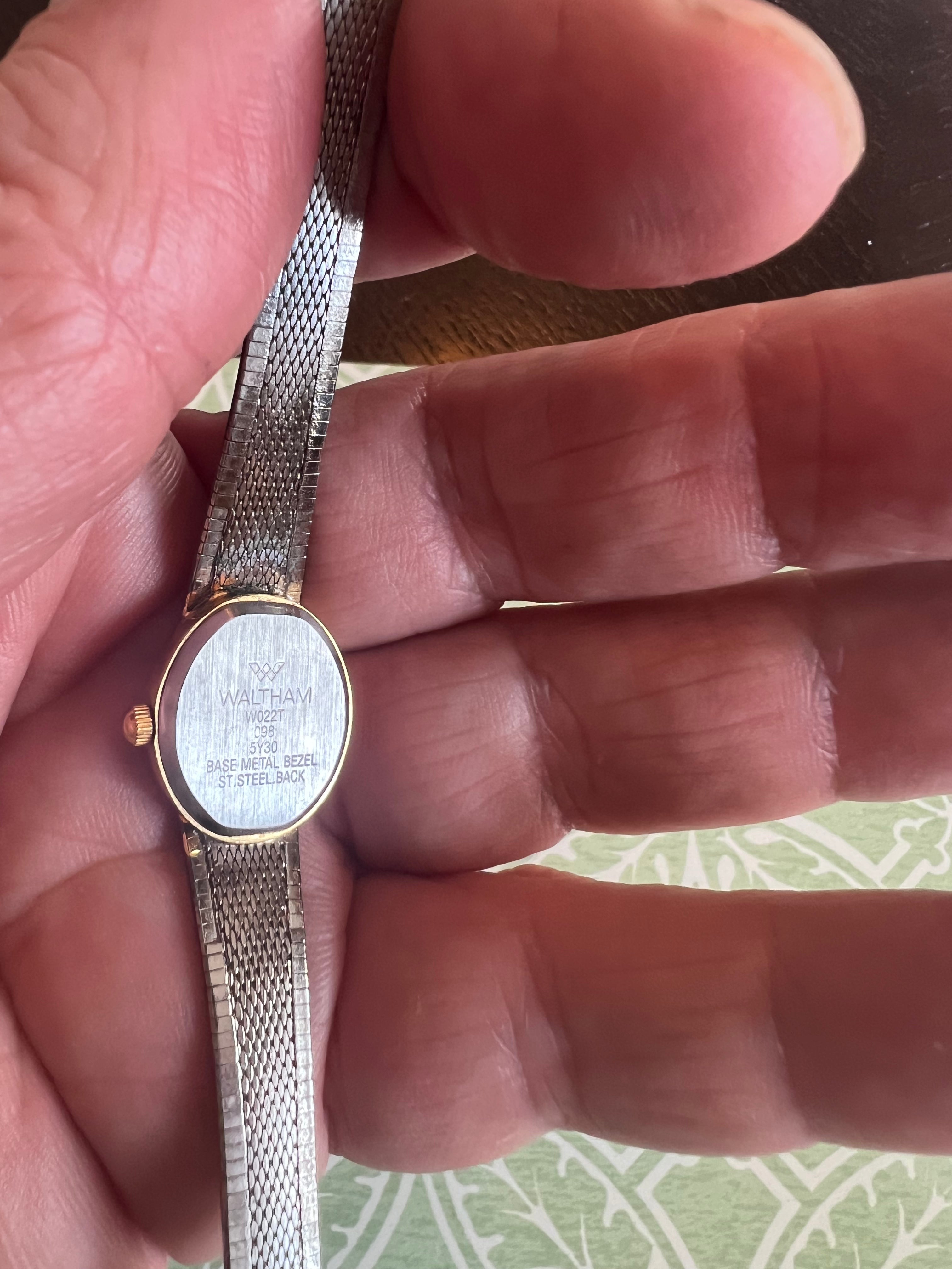 Vintage ladies Waltham dainty gold tone watch. Runs perfectly.