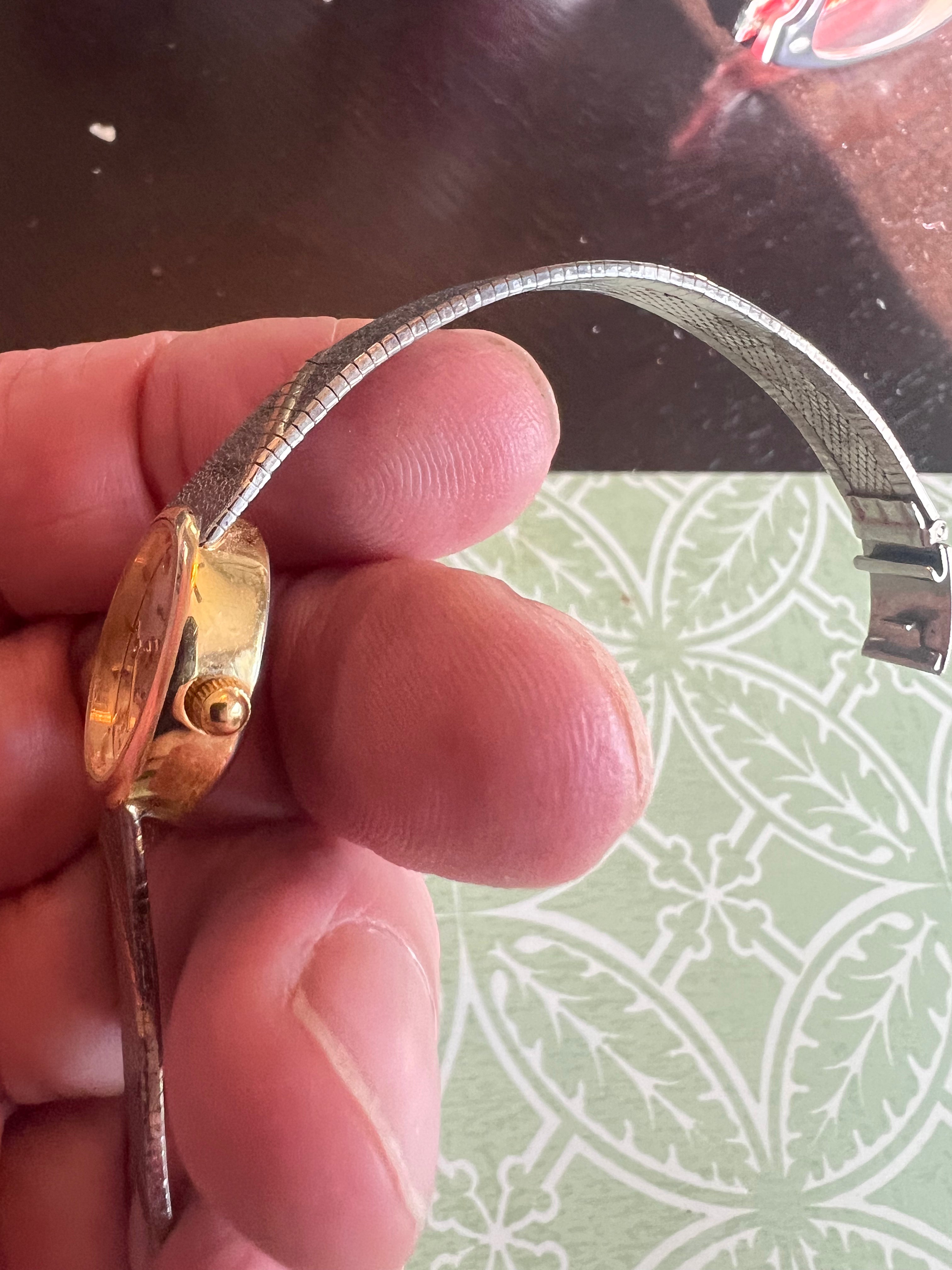 Vintage ladies Waltham dainty gold tone watch. Runs perfectly.