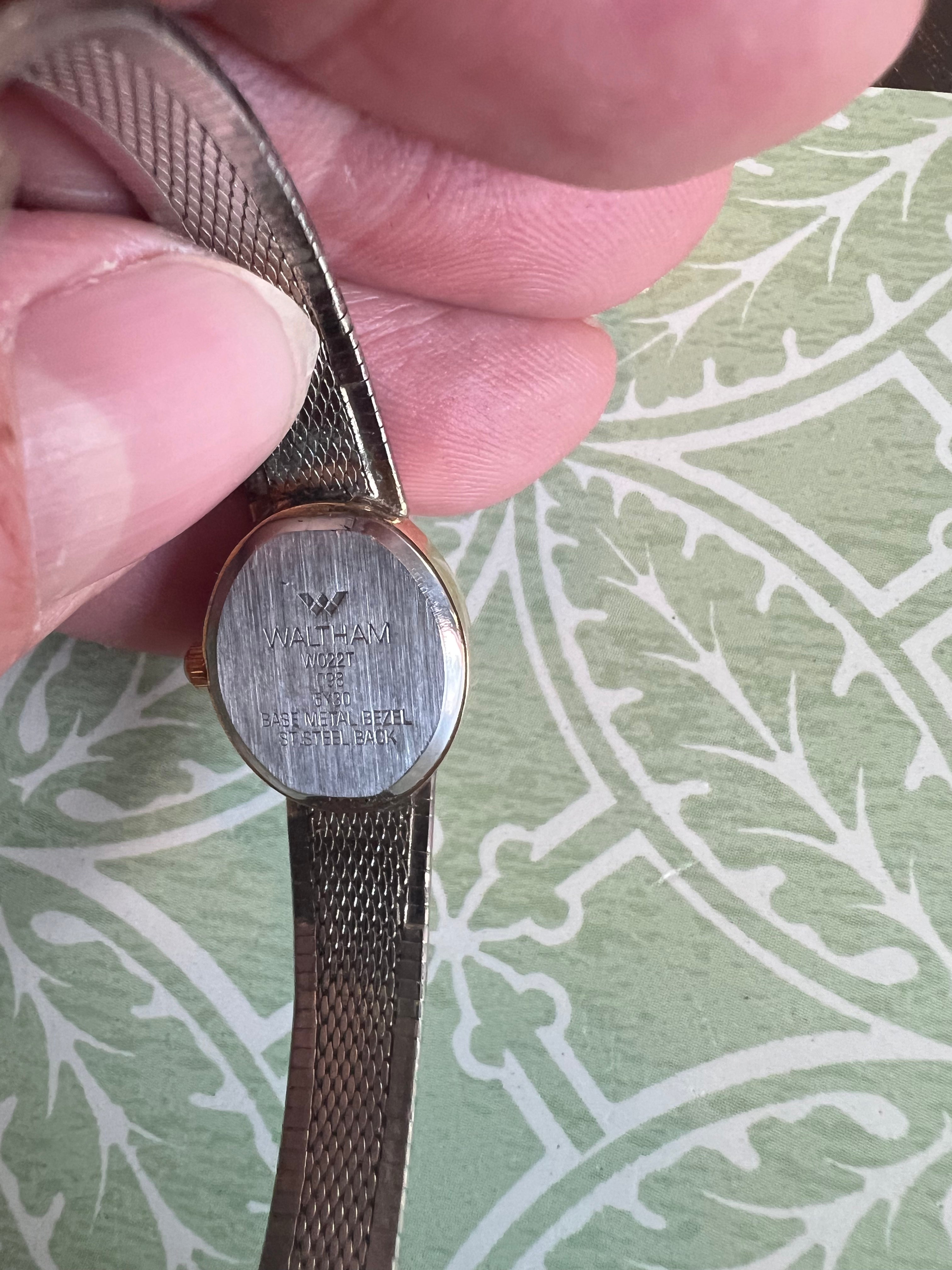 Vintage ladies Waltham dainty gold tone watch. Runs perfectly.