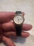 Ladies 1989 Advance gold tone dainty watch with alligator band