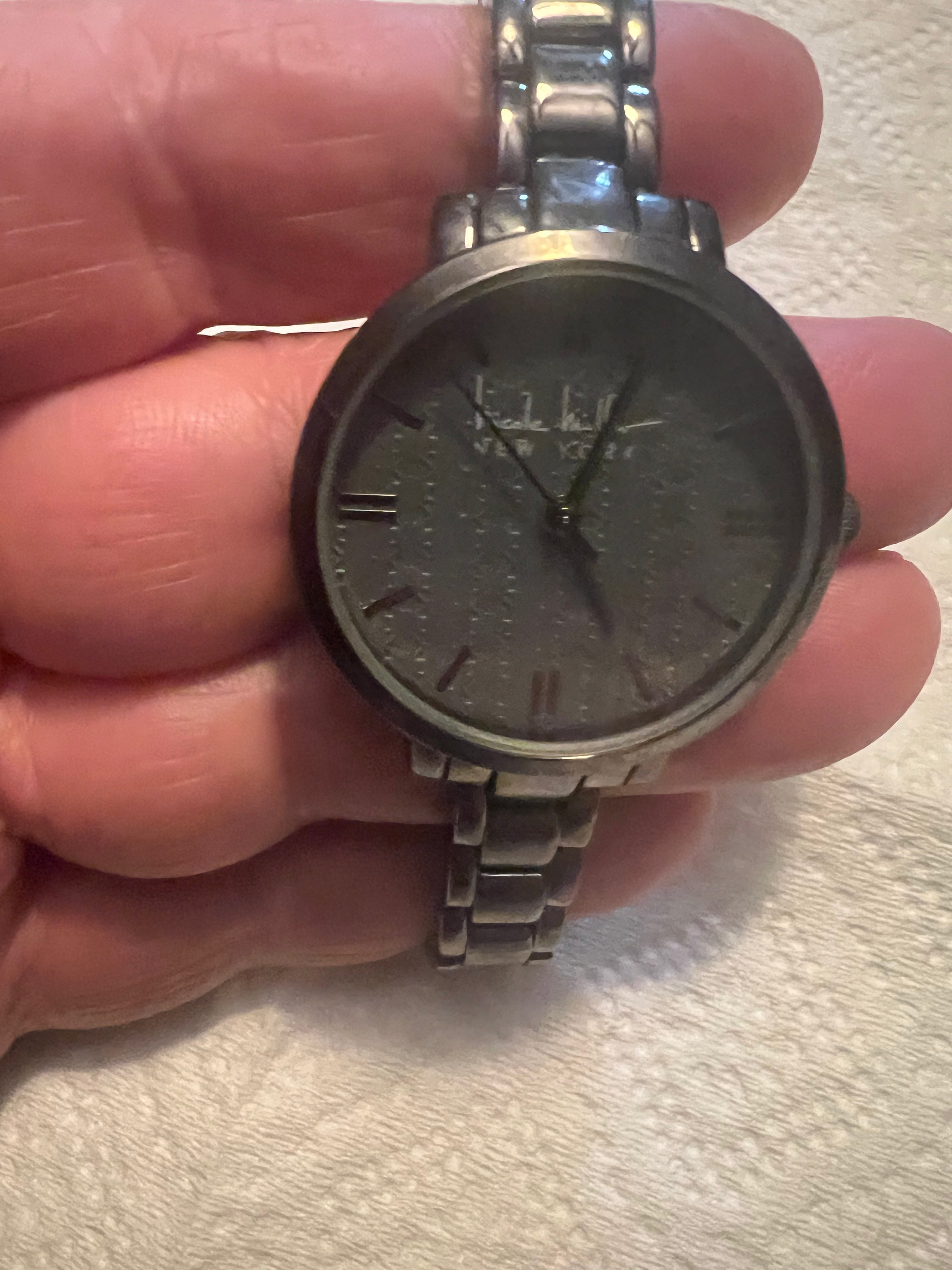 Ladies Nicole Miller dress watch gray embossed detail dial