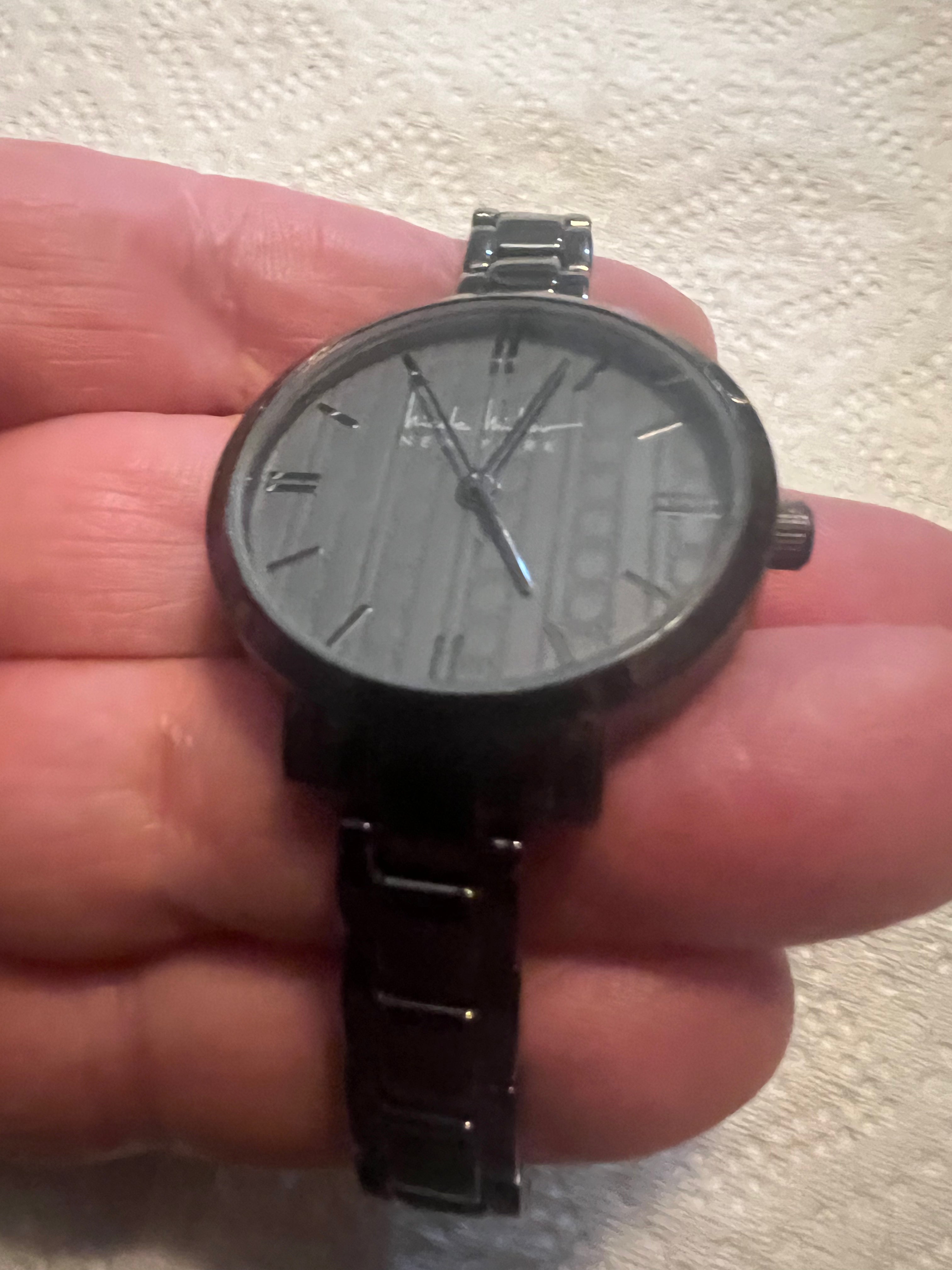 Ladies Nicole Miller dress watch gray embossed detail dial