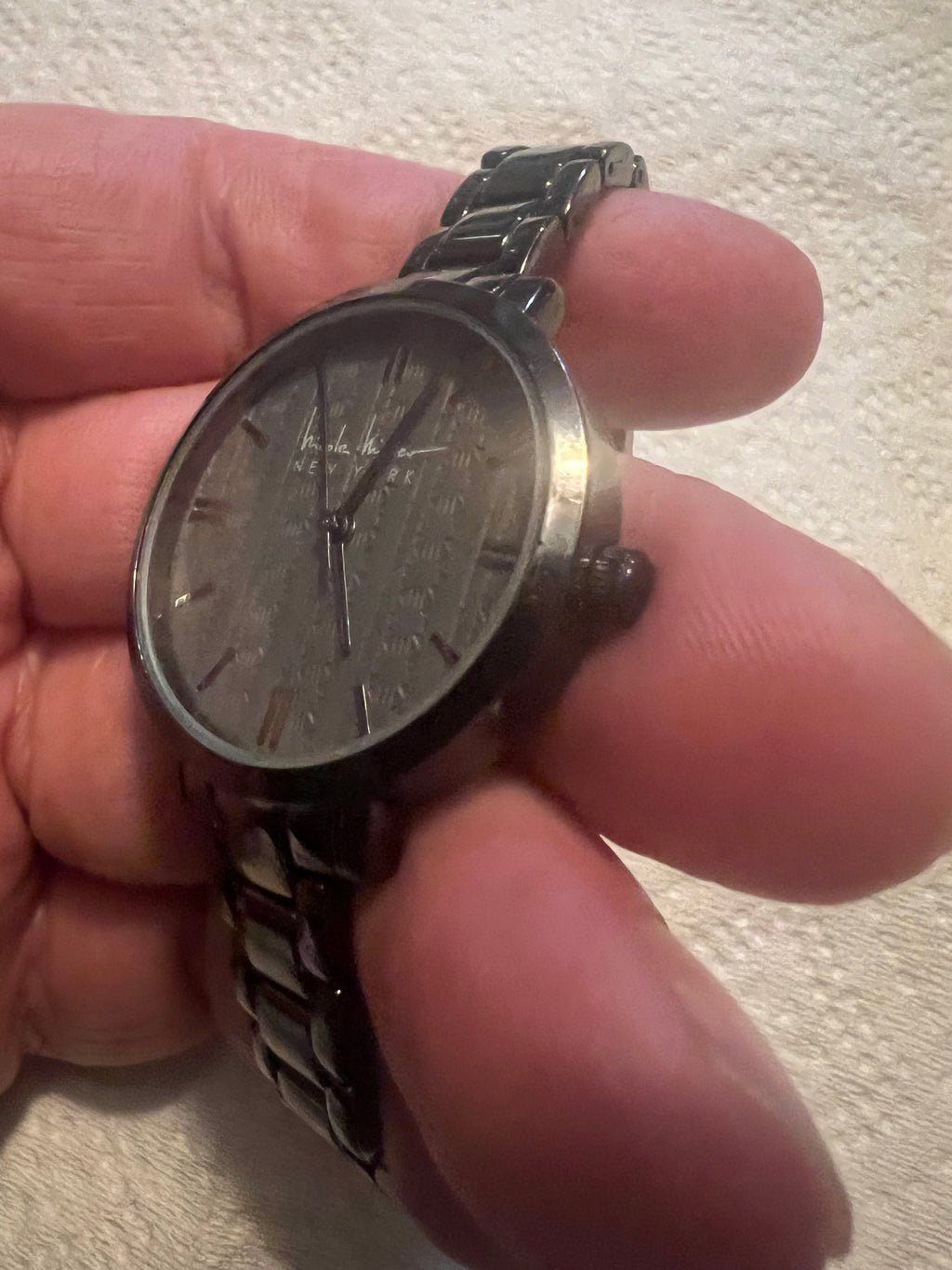 Ladies Nicole Miller dress watch gray embossed detail dial