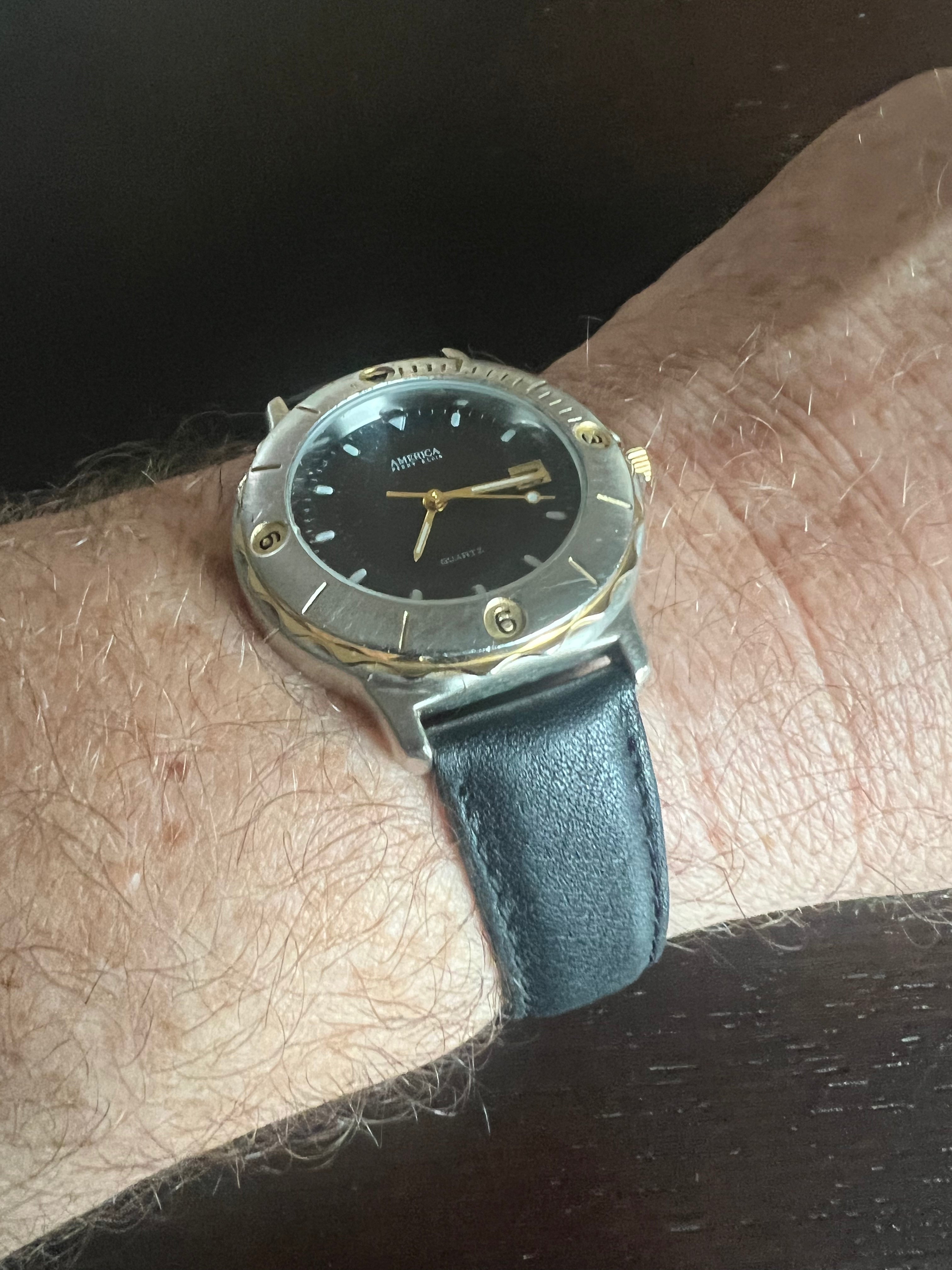 Men’s Perry Ellis America 2 tone watch black leather strap, new battery.