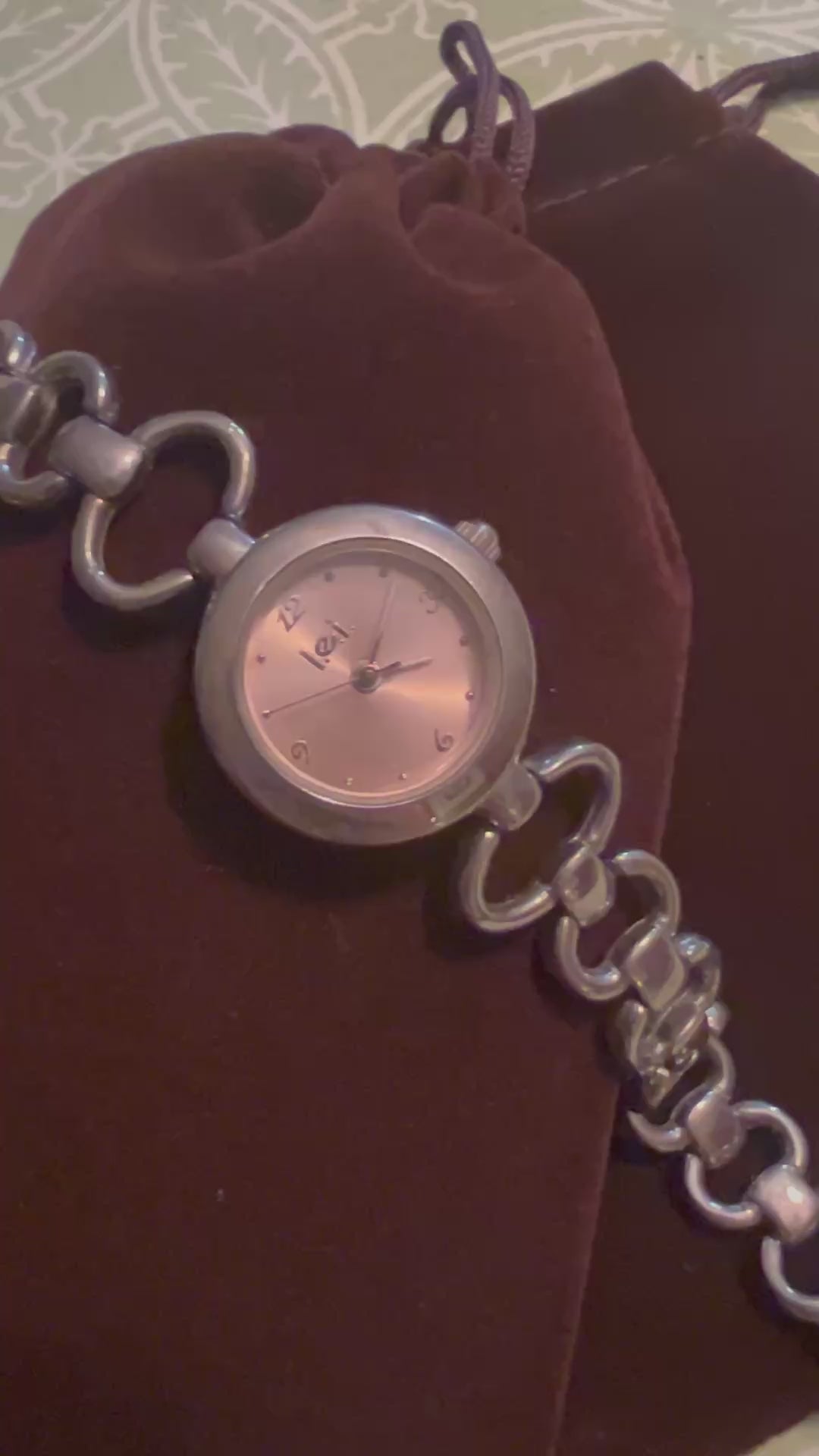 90’s LEI dainty ladies watch. Silver tone, pink dial, new battery, gasket, and gift pouch