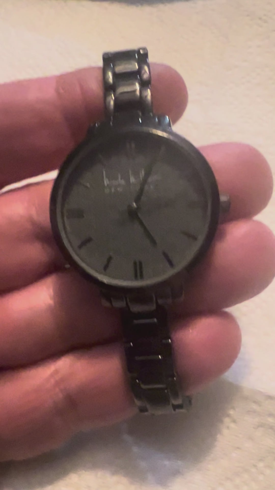 Ladies Nicole Miller dress watch gray embossed detail dial