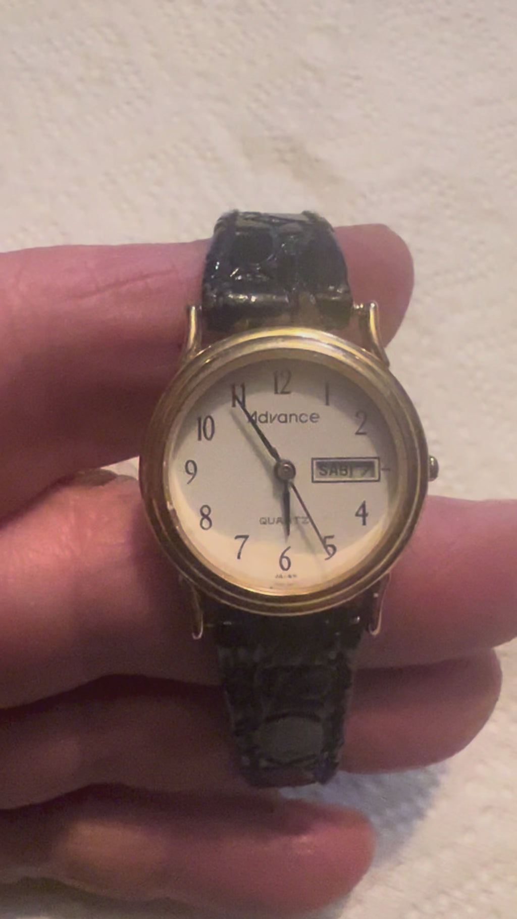 Ladies 1989 Advance gold tone dainty watch with alligator band